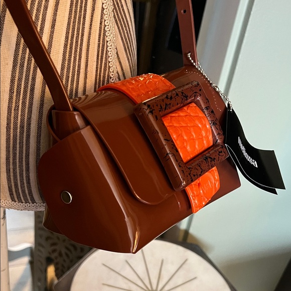 Melissa Handbags - NWT. Melissa, Brown Shoulder Bag with Bright Orange Strap & Statement Buckle